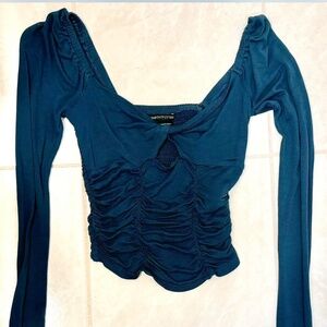 Long sleeve cinched waist crop top